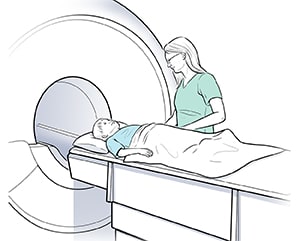 Technician preparing child for CT scan.